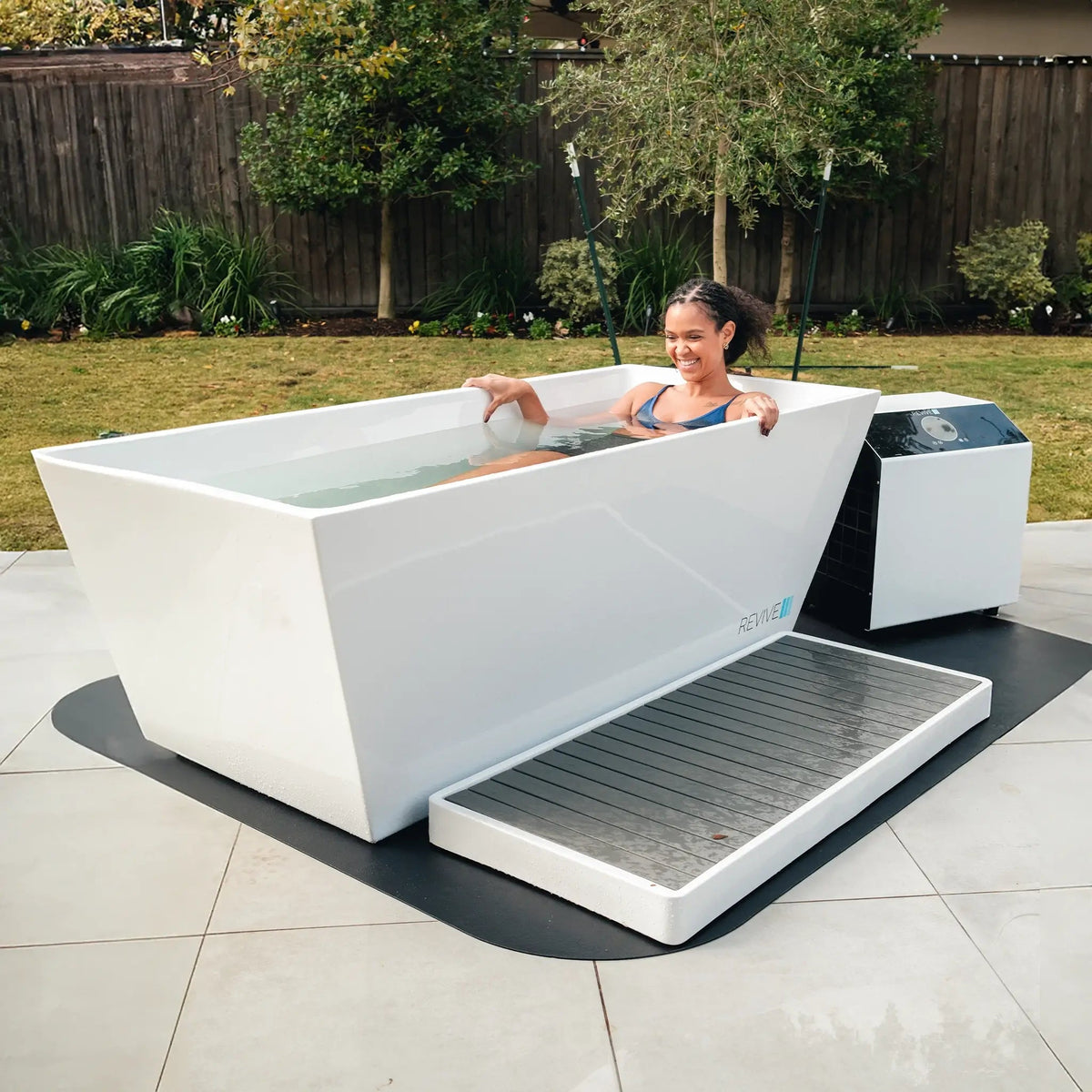 Revive Acrylic Cold Plunge installed in an outdoor recovery space